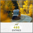 QUICK ENTRY -  $45 - Camper van driving through a grove of yellow aspen trees during the autumn season.